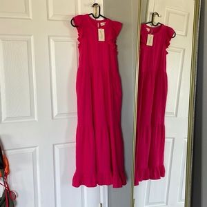 Long pink dress with ruffles.
